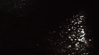 Peeing in front of my car while waiting for a train to pass