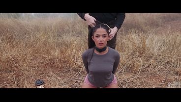 Super-hot babe gets taken to the mountains to be spanked, bound, and trained with piss